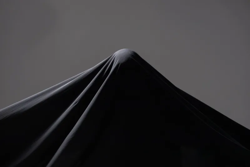 Silhouette as Signature: How Halston's Design Language Became Cinema's Shorthand for Power